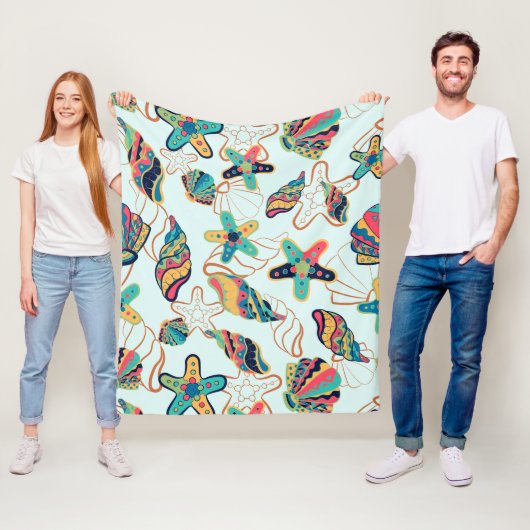 Kleurrijke zeeschelpen patroon fleece deken (In situ)