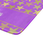 Kleurrijke zeester op paars snijplank (Hoek)