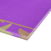 Kleurrijke zeester op paars snijplank (Hoek)