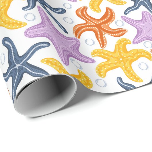 Kleurrijke zeesterren op wit cadeaupapier (Rol Hoek)