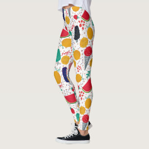 Kleurrijke zomerlevensmiddelen en bloemen collage leggings