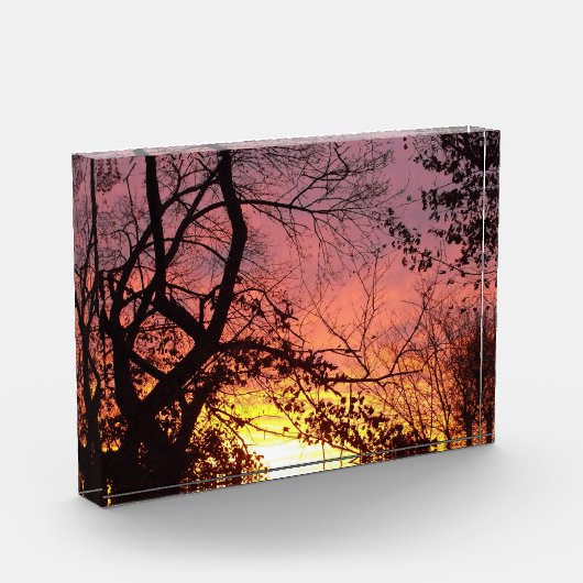 Kleurrijke zonsondergang door haarstomen fotoblokken (Links)