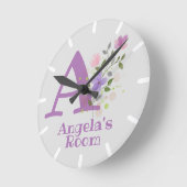 Klok in een bloemenontwerp met naam Angela (Hoek)