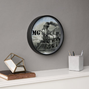 Klok met stoomlocomotief voor aan de muur