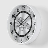 Klok voor 25-jarig huwelijksjubileum aan de muur (Hoek)