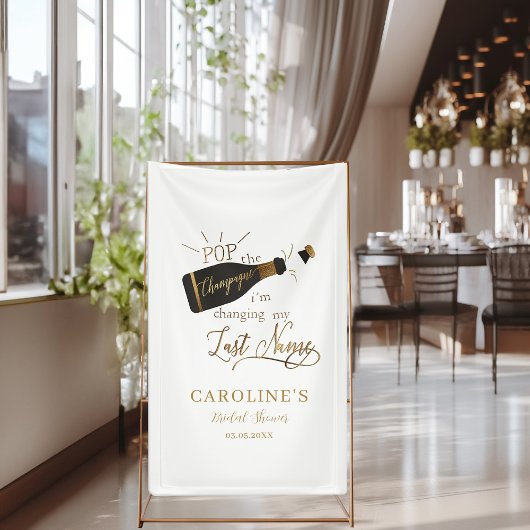 Knal de champagne, ik verander mijn achternaam! spandoek