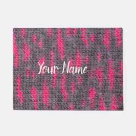 Knietwolstructuur met roze en grijze kleuren deurmat