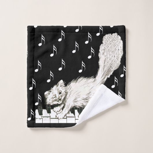 Knipperen pluizige witte kat lopen op piano sleute washandje (Wasdoekje)