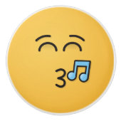 Knipperend gezicht met glimlachende ogen keramische knop (Voorkant)