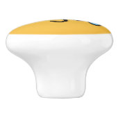 Knipperend gezicht met glimlachende ogen keramische knop (Zijkant)