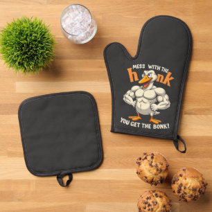 Knoeien met de honk krijg je de Bonk Fitness Ovenwant & Pannenlap Set