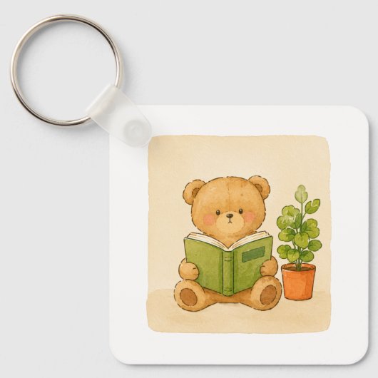 Knuffelige teddybeer leest boek sleutelhanger (Voorkant)