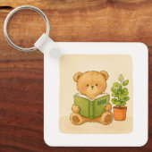 Knuffelige teddybeer leest boek sleutelhanger (Voorkant)