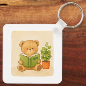 Knuffelige teddybeer leest boek sleutelhanger (Achterkant)