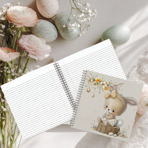 knuffelkonijn met paaseieren in een bloemenweide notitieboek