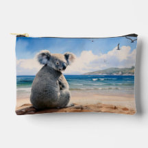 Koala op een zandstrand