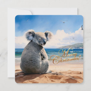 Koala op een zandstrand Prettig kerstfeest Feestdagenkaart