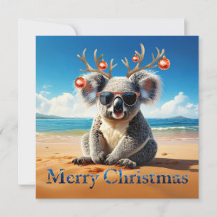 Koala op een zandstrand Prettig kerstfeest Feestdagenkaart