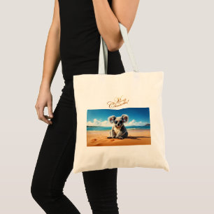 Koala op een zandstrand Prettig kerstfeest Tote Bag
