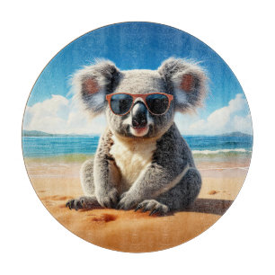 Koala op een zandstrand snijplank