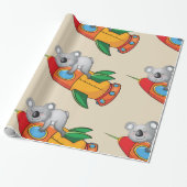 Koala slapen op kleurrijke raket cadeaupapier (Uitgerold)