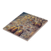 Kobbelstenen golden light voor stenen grafische ku tegeltje (Zijkant)