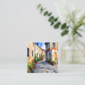 Kobbelstenen pad in een mediterrane omgeving vierkante visitekaartje (Staand voorkant)