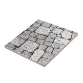 Kobblestenen van een straat in detail tegeltje (Zijkant)