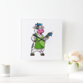 Koe als schilder met verf vierkante klok (Huis)