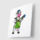 Koe als schilder met verf vierkante klok (Hoek)