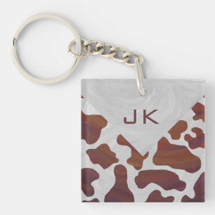 Koe bruin en wit monogram sleutelhanger
