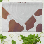 Koe bruin en wit monogram theedoek (Gevouwen)