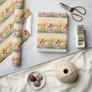 Koe die een banjo speelt op een deken cadeaupapier