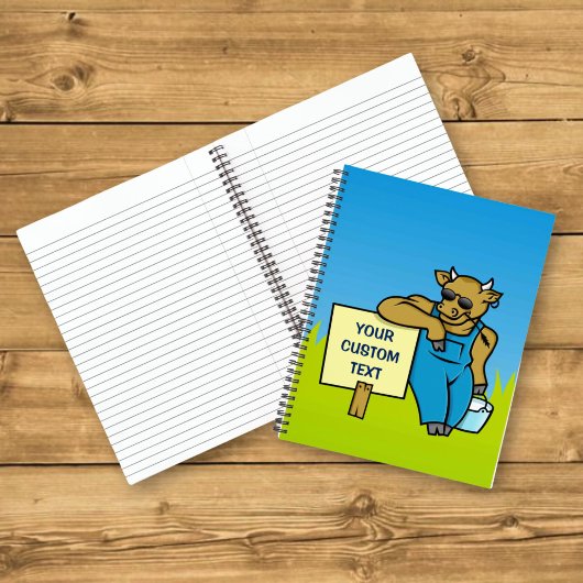 Koe met bord notitieboek