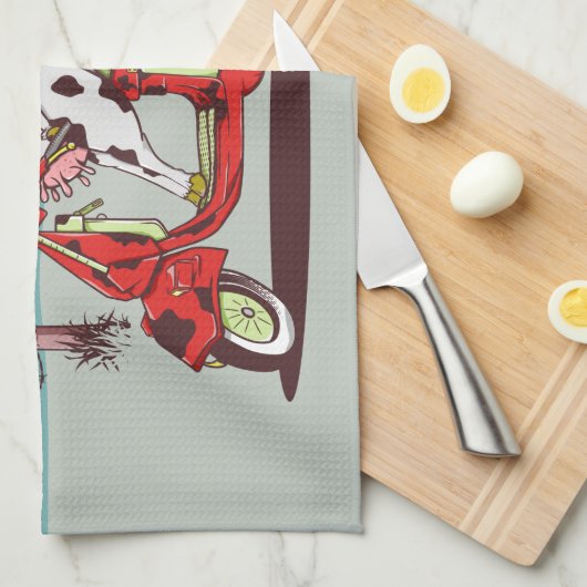 Koe met een  motor theedoek (Quarter Fold)