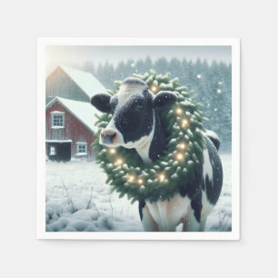 Koe met een stralende kerstkrans servet