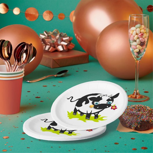 Koe met een ventilator papieren bordje