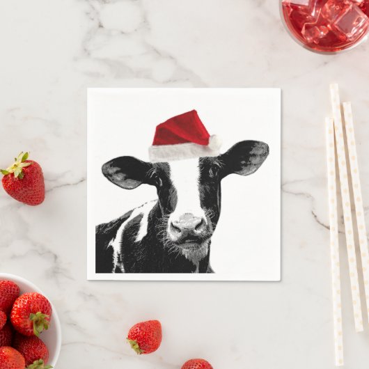 Koe met kerstmuts in de hand servetten (Insitu)