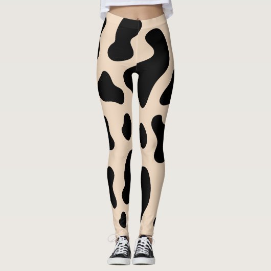 Koe voor huid en zwart afdrukken leggings (Voorkant)