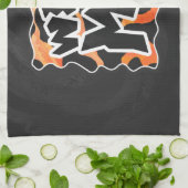 Koe Zwart en Oranje Wild mij Theedoek (Gevouwen)