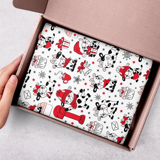 Koeien voor kerstfeestdagen bevestigen een modern  tissuepapier