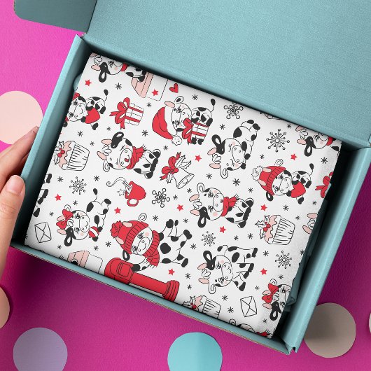 Koeien voor kerstfeestdagen bevestigen een modern  tissuepapier