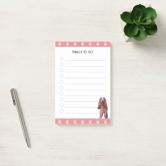 Koeiende spaniel met een patroonpatroon post-it® notes (Kantoor)