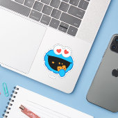 Koekjesglimlachend gezicht met hartvormige ogen sticker (Laptop met iPhone)