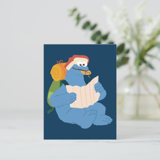 Koekjesmonster die een kaart leest (Staand voorkant)