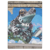 Koel kikker tussen verstuifblikken klembord (Achterkant)