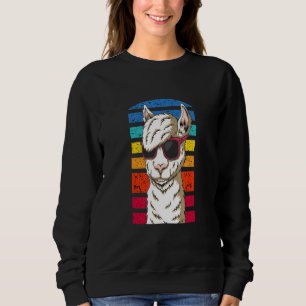 Koel lama met een mooi kapsel met zonnebril trui