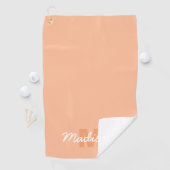 Koel pastelkleurig perzik kleur met aangepaste mon golfhanddoek (Insitu)