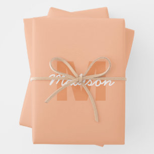 Koel pastelkleurig perzik kleur met aangepaste mon inpakpapier vel