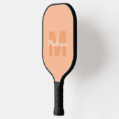 Koel pastelkleurig perzik kleur met aangepaste mon pickleball paddle (Links)